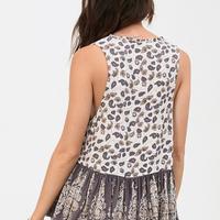 Delirium Cream Sleeveless Blouse